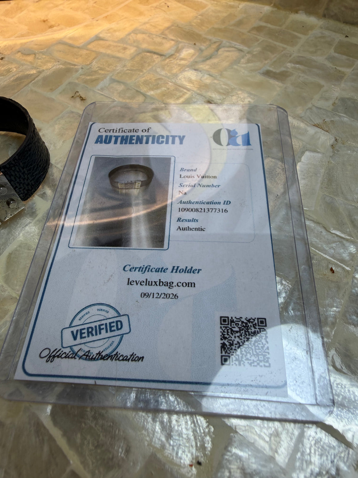 Close-up of Louis Vuitton bracelet certificate of authenticity