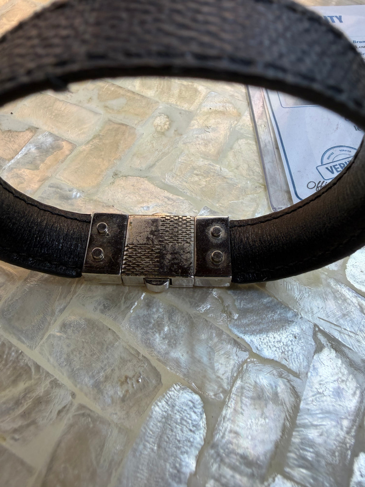 Louis Vuitton bracelet with COA and black textured band