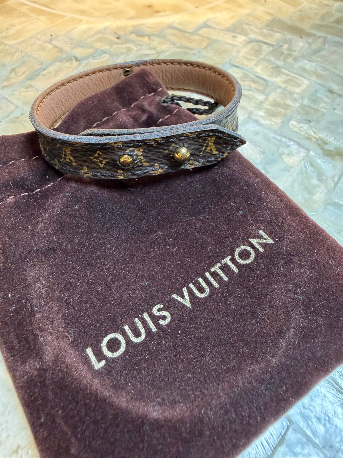 Louis Vuitton cuff bracelet clasp and Damier Graphite pattern