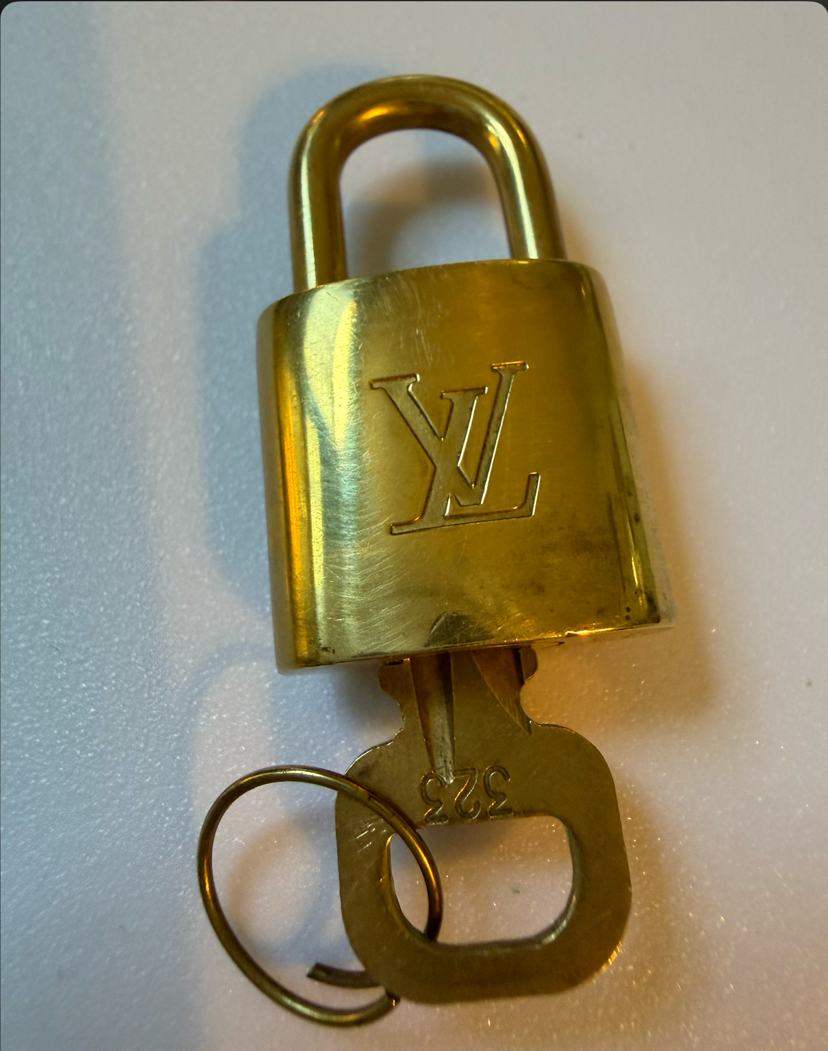 Louis Vuitton padlock with matching key #323