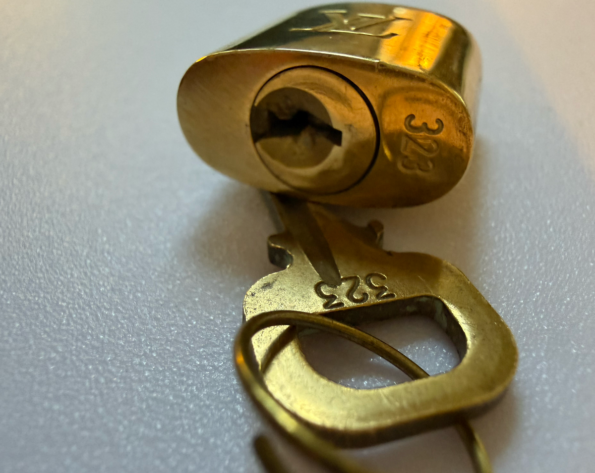 Louis Vuitton padlock with matching key #323