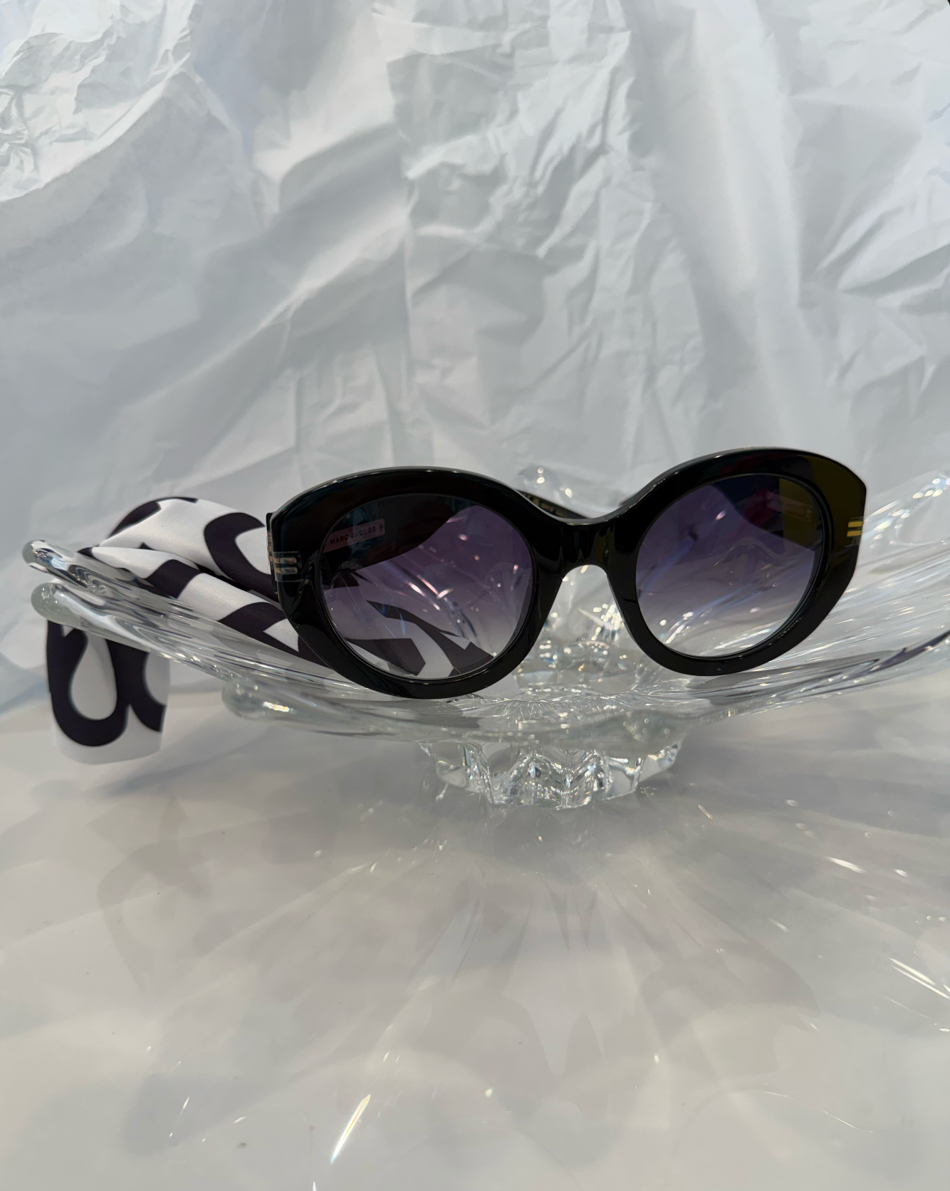 Marc Jacobs MJ1110/S textured silver monogram temple close-up with Marc Jacobs plaque