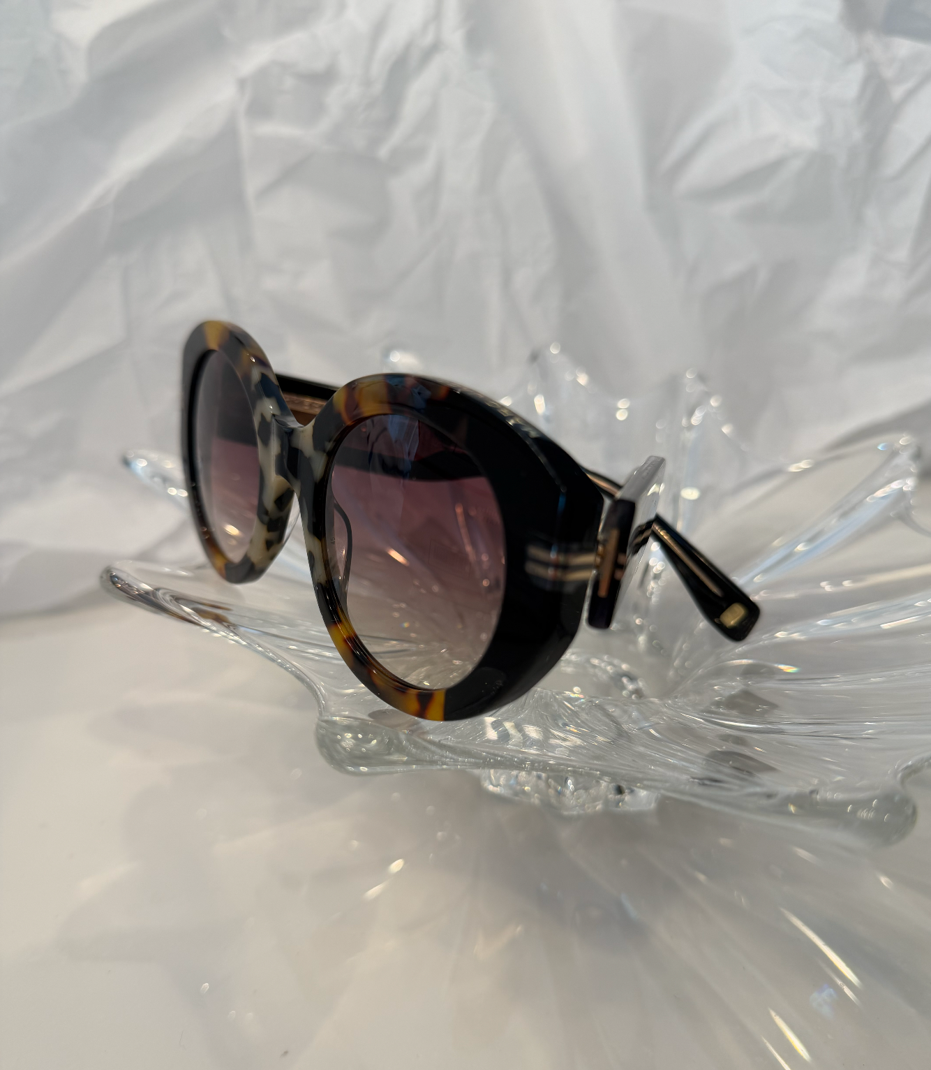 Marc Jacobs MJ1110/S tortoise shell and black sunglasses side profile on crystal display
