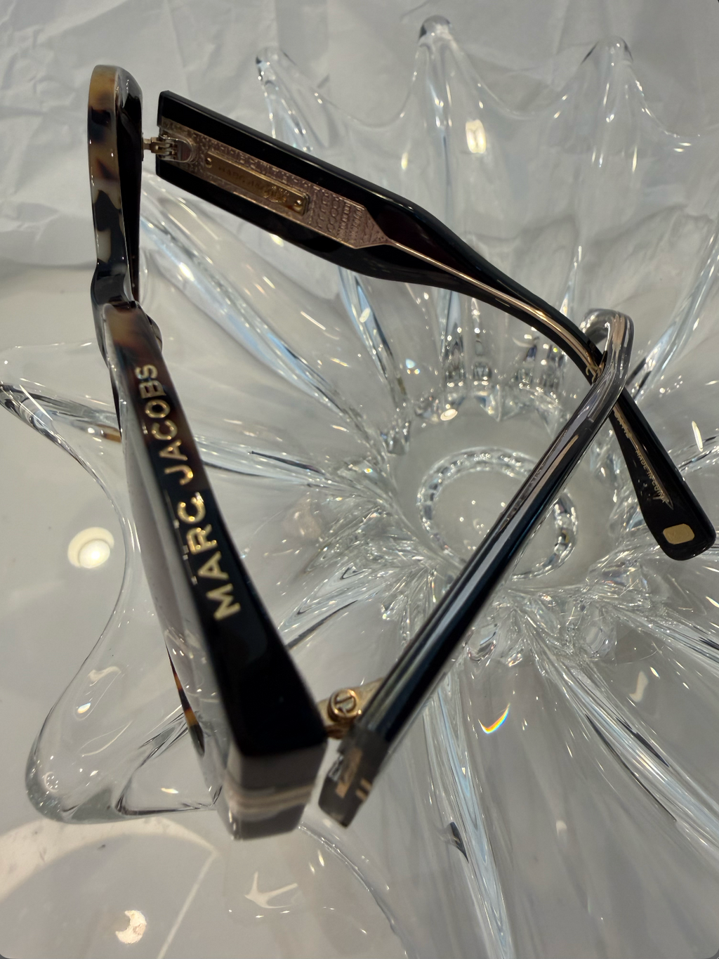 Marc Jacobs MJ1110/S tortoise shell oval sunglasses rear view on crystal display