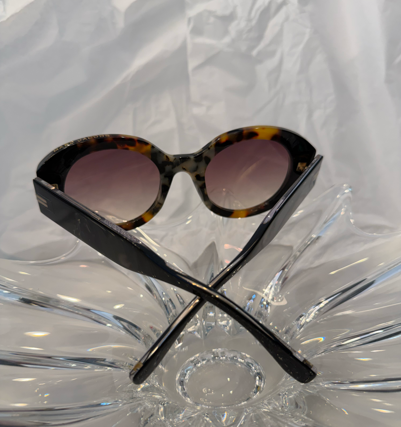 Marc Jacobs MJ1110/S tortoise shell oval sunglasses front view on crystal display