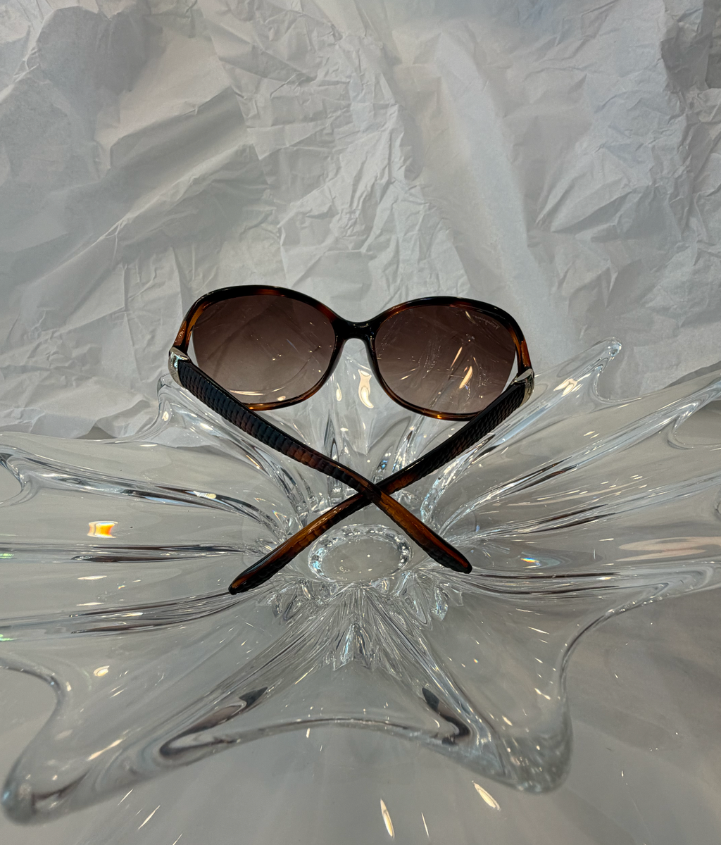 Salvatore Ferragamo oversized butterfly sunglasses side view showing amber tortoise frame gradient