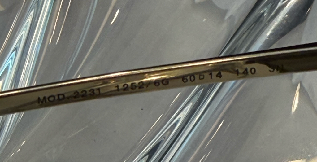 Versace MADE IN ITALY CE UKCA engraving on gold temple