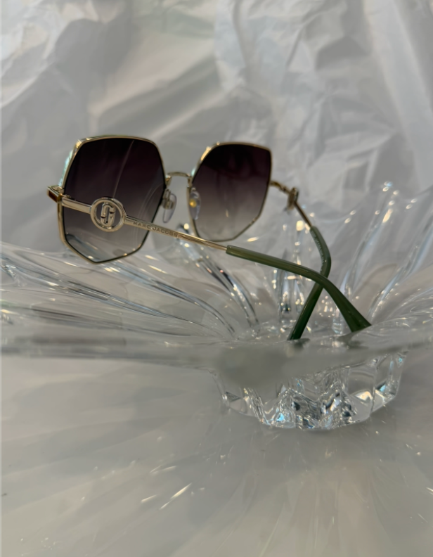 Marc Jacobs MARC 730/S gold oversized square sunglasses side angle view on crystal display