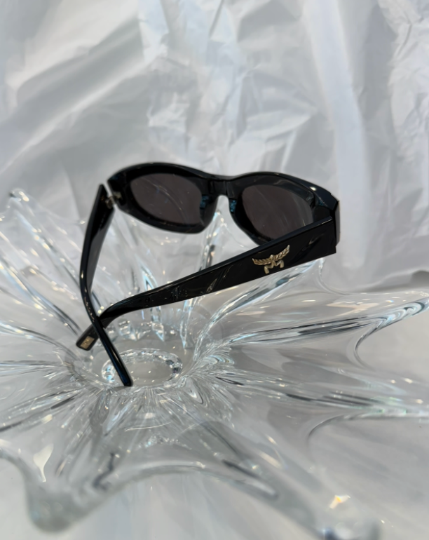 MCM rectangular cat-eye sunglasses back view showing gold Laurel logo hardware on crystal display