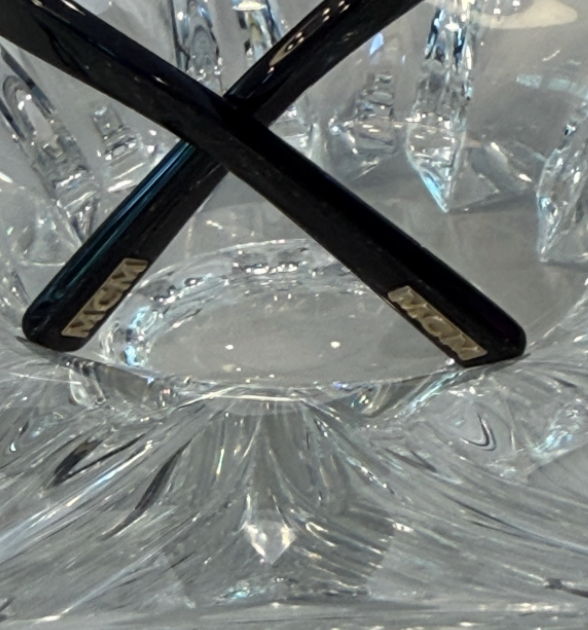 MCM rectangular cat-eye sunglasses side angle view on crystal display