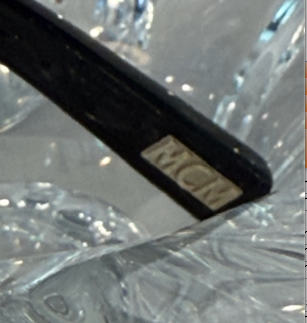 MCM rectangular cat-eye sunglasses front view on crystal display