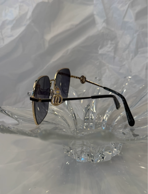 Marc Jacobs MARC 729/S geometric sunglasses back view showing gradient blue lenses on crystal display