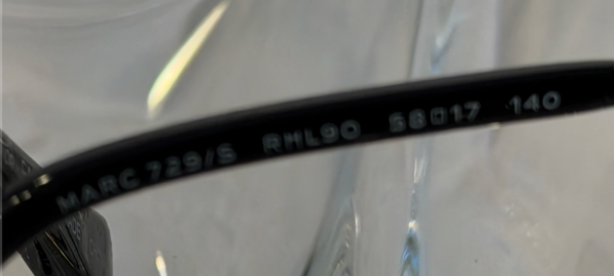 Marc Jacobs NYC 1984 branding on black acetate temple with CE and CAT.3 markings