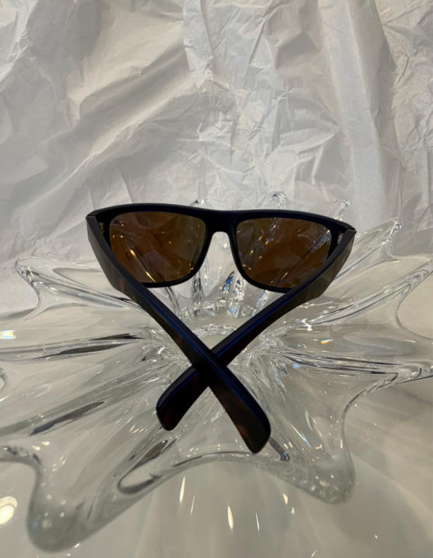 Spyder SP6014 sunglasses front view showing blue mirror lenses on crystal display
