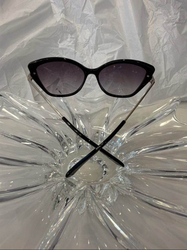 Longchamp LO627S black cat-eye sunglasses additional angle view on crystal display