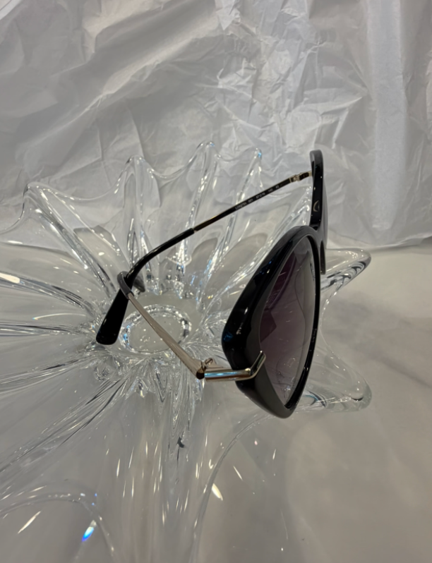 LONGCHAMP branding engraved on silver metal temple with CE marking