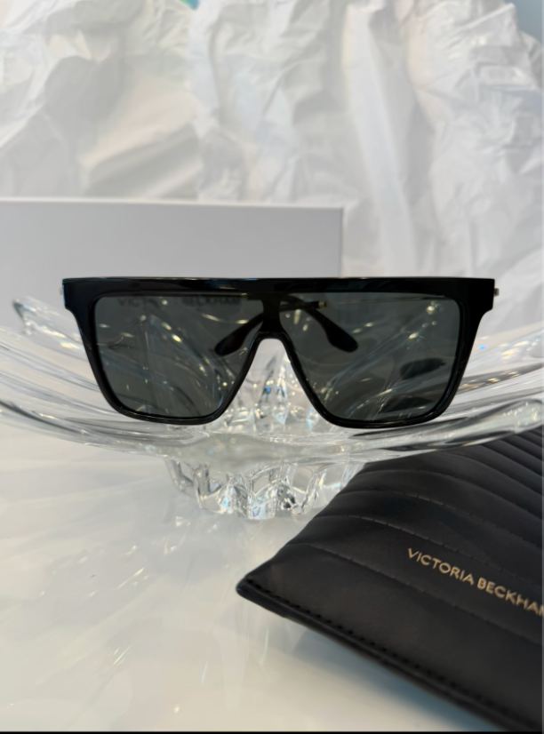Victoria Beckham VB605S black shield flat-top sunglasses back view showing silver metal bridge and temples
