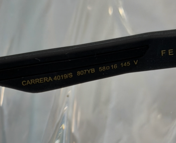 Carrera 4019/S Festival Edition black flat-top sunglasses additional side view on crystal display