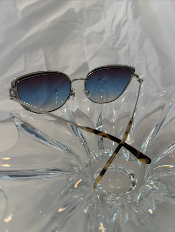 Kate Spade STACUG/S Hello Sunshine silver cat-eye sunglasses back view showing tortoise acetate temple tips on crystal display