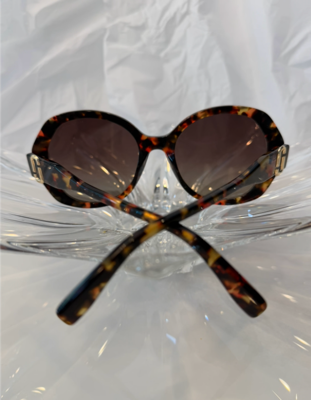 Marc Jacobs MARC 763/S havana tortoise oversized round sunglasses back view with temples crossed on crystal display