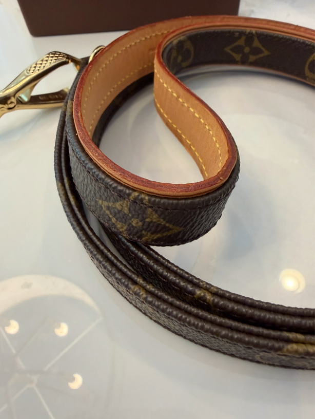 Made in France stamp and gold-tone clasp detail