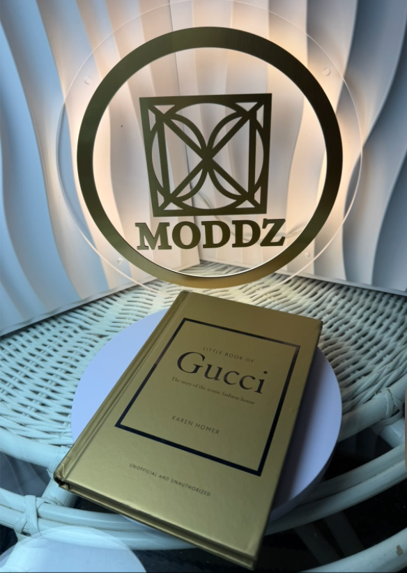 Little Book of Gucci gold hardcover front with MODDZ display