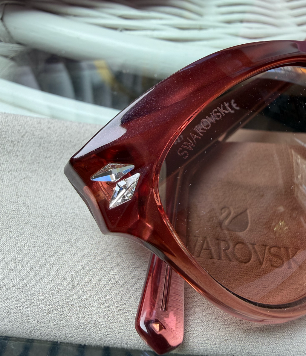 Swarovski cat-eye sunglasses front view gradient burgundy to pink acetate with brown lenses