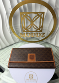 Céline Macadam wallet interior showing zip pocket and snap closure