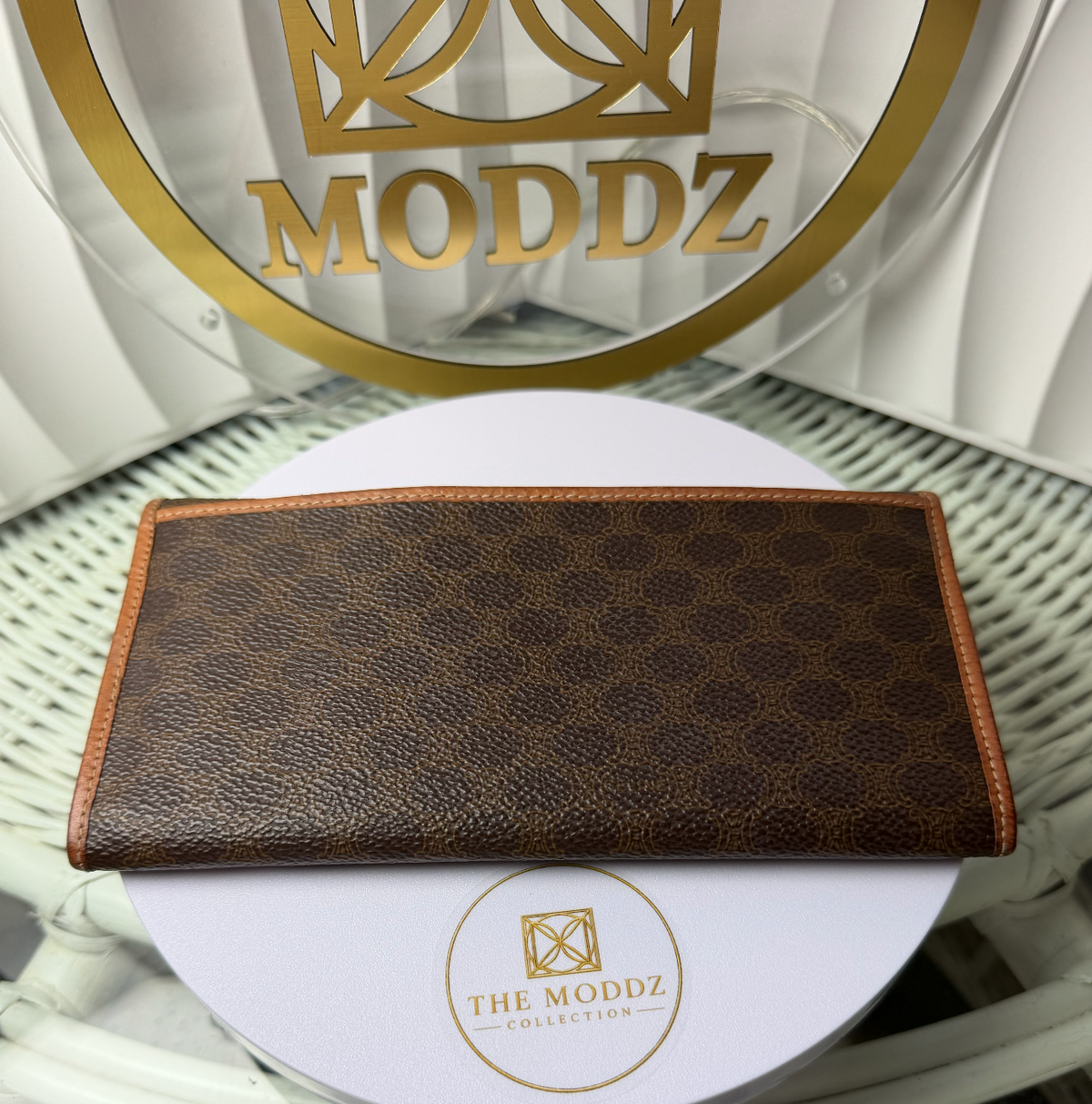 Céline Macadam wallet open showing interior compartments